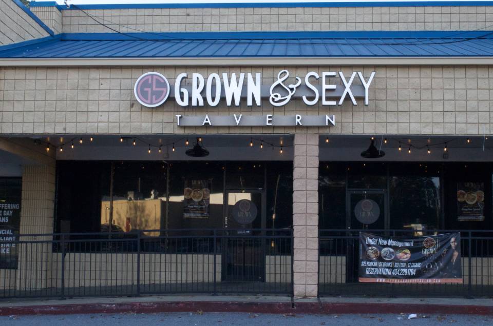Facade-of-Grown-Sexy-Tavern-with-a-sign-and-string-lights